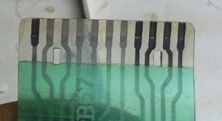 contactos ya limpios en la cinta teclado del horno microondas