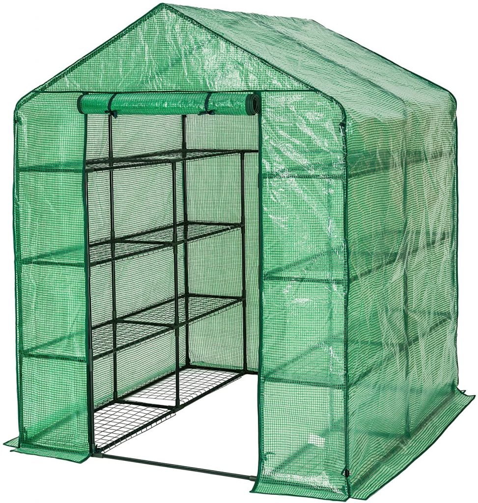 un invernadero para vegetales y flores en su jardín o terraza