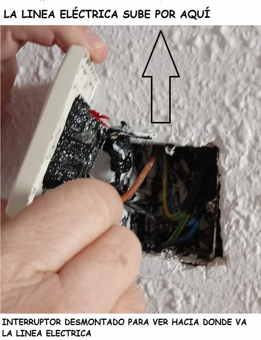 INTERRUPTOR DESMONTADO PARA VER HACIA DONDE VA LA LINEA ELECTRICA